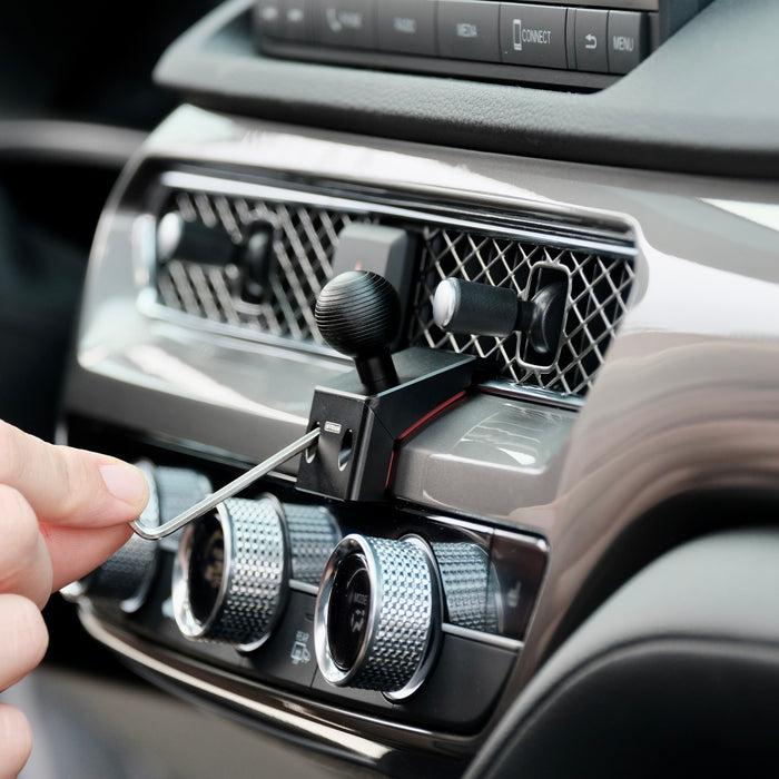 Image of Offroam Mounting Base installed securely in Acura Integra 2023-2026. This premium all metal phone mounting base installs easily without drilling or glue. Perfect placement without blocking screens, driver view, or air flow.