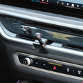 Image of Offroam Mounting Base installed securely in BMW X5 2024-2026 | X6 2024-2027 | X7 2023-2027. This premium all metal phone mounting base installs easily without drilling or glue. Perfect placement without blocking screens, driver view, or air flow.