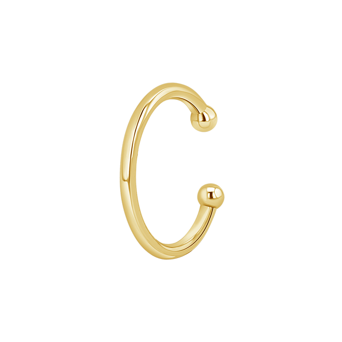 Solid ear cuff made of 14k yellow gold.