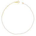 A dainty freshwater pearl anklet with 14k solid yellow gold chain and clasp.