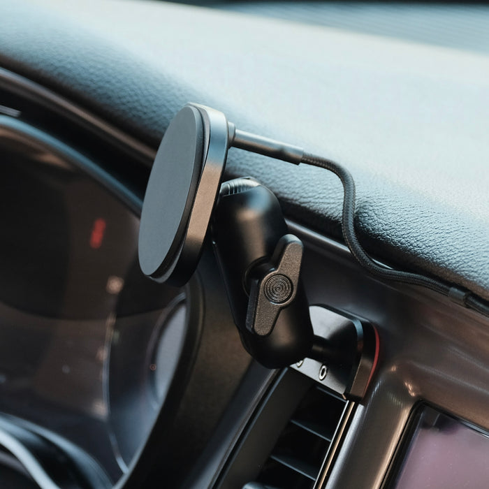Image of Offroam MagSafe-compatible Phone Mount installed securely in Dodge Challenger 2015-2023. This premium phone mount installs easily without drilling or glue. High force magnets hold phone on any trail, road, or track. Perfect placement without blocking screens, driver view, or air flow. Fully adjustable positioning.