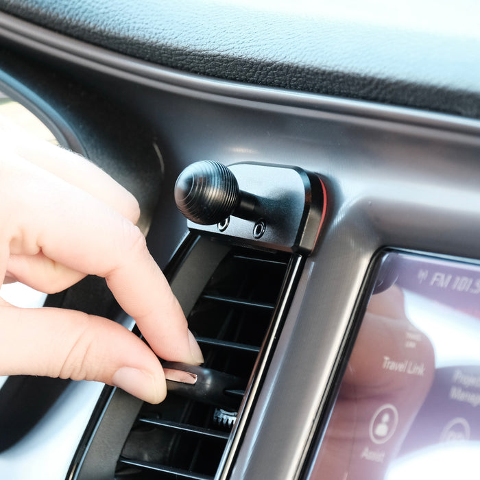 Image of Offroam Mounting Base installed securely in Dodge Challenger 2015-2023. This premium all metal phone mounting base installs easily without drilling or glue. Perfect placement without blocking screens, driver view, or air flow.