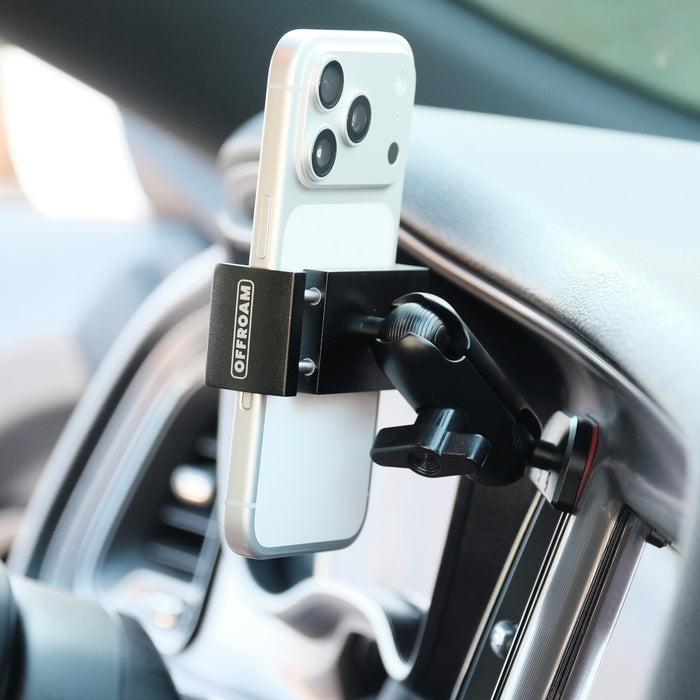 Image of Offroam Phone Mount installed securely in Dodge Challenger 2015-2023. This premium phone mount installs easily without drilling or glue. Spring loaded Universal holder for use with any phone. Perfect placement without blocking screens, driver view, or air flow. Fully adjustable positioning.