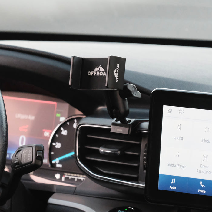 Image of Offroam Phone Mount installed securely in Ford Explorer 2020-2024. This premium phone mount installs easily without drilling or glue. Spring loaded Universal holder for use with any phone. Perfect placement without blocking screens, driver view, or air flow. Fully adjustable positioning.