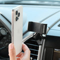 Image of Offroam Phone Mount installed securely in Ford F-150 2015-2020 | Super Duty 2017-2021 & 2022 (XL and XLT) | Expedition 2018-2021. This premium phone mount installs easily without drilling or glue. Spring loaded Universal holder for use with any phone. Perfect placement without blocking screens, driver view, or air flow. Fully adjustable positioning.