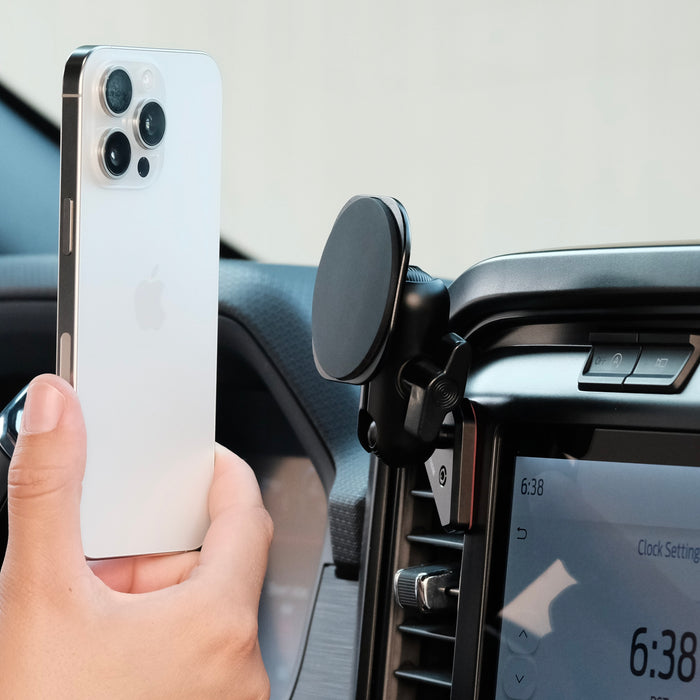 Image of Offroam MagSafe-compatible Phone Mount installed securely in Ford F-150 2021-2026 | F-250/F-350 2023-2026 | F-150 Lightning (XL & PRO) 2022-2026. This premium phone mount installs easily without drilling or glue. High force magnets hold phone on any trail, road, or track. Perfect placement without blocking screens, driver view, or air flow. Fully adjustable positioning.