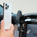 Image of Offroam MagSafe-compatible Phone Mount installed securely in Ford F-150 2021-2026 | F-250/F-350 2023-2026 | F-150 Lightning (XL & PRO) 2022-2026. This premium phone mount installs easily without drilling or glue. High force magnets hold phone on any trail, road, or track. Perfect placement without blocking screens, driver view, or air flow. Fully adjustable positioning.