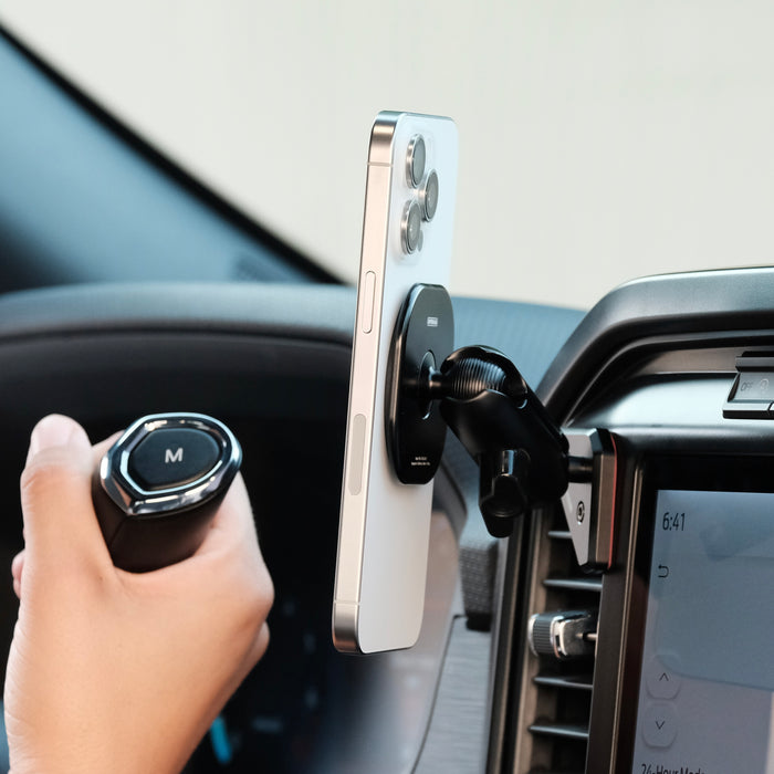 Image of Offroam MagSafe-compatible Phone Mount installed securely in Ford F-150 2021-2026 | F-250/F-350 2023-2026 | F-150 Lightning (XL & PRO) 2022-2026. This premium phone mount installs easily without drilling or glue. High force magnets hold phone on any trail, road, or track. Perfect placement without blocking screens, driver view, or air flow. Fully adjustable positioning.