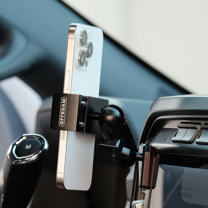Image of Offroam Phone Mount installed securely in Ford F-150 2021-2026 | F-250/F-350 2023-2026 | F-150 Lightning (XL & PRO) 2022-2026. This premium phone mount installs easily without drilling or glue. Spring loaded Universal holder for use with any phone. Perfect placement without blocking screens, driver view, or air flow. Fully adjustable positioning.