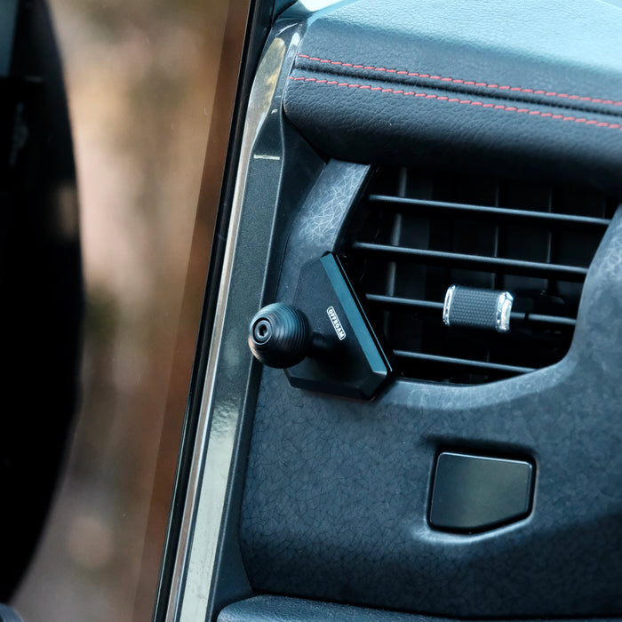 Image of Offroam Mounting Base installed securely in Ford F-150 Lightning 2022-2025 (Lariat & Platinum) | Expedition 2022-2024. This premium all metal phone mounting base installs easily without drilling or glue. Perfect placement without blocking screens, driver view, or air flow.