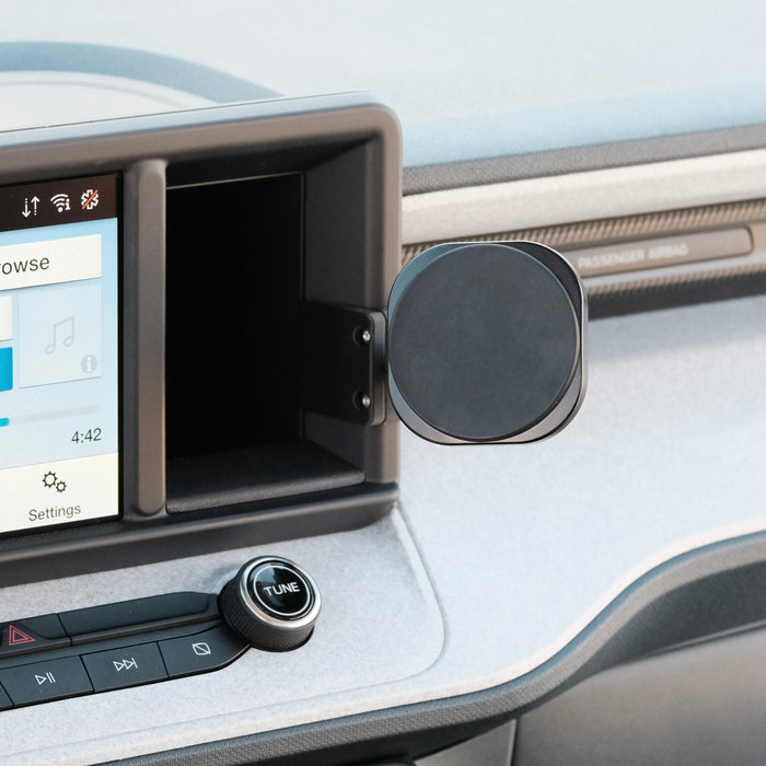 Image of Offroam MagSafe-compatible Phone Mount installed securely in Ford Maverick 2022-2024. This premium phone mount installs easily without drilling or glue. High force magnets hold phone on any trail, road, or track. Perfect placement without blocking screens, driver view, or air flow. Fully adjustable positioning.