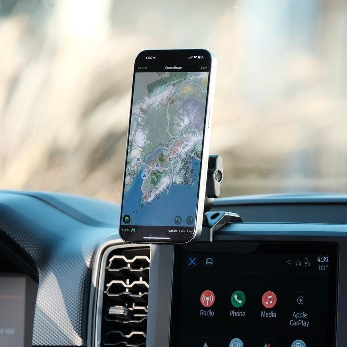Image of Offroam MagSafe-compatible Phone Mount installed securely in Ford Ranger 2024-2026. This premium phone mount installs easily without drilling or glue. High force magnets hold phone on any trail, road, or track. Perfect placement without blocking screens, driver view, or air flow. Fully adjustable positioning.