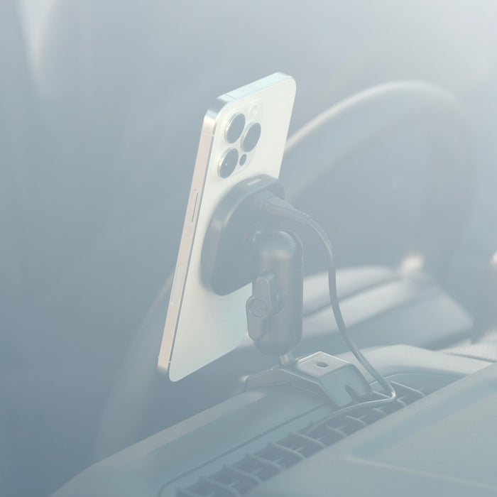 Image of Offroam MagSafe-compatible Phone Mount installed securely in Ford Ranger 2024-2026. This premium phone mount installs easily without drilling or glue. High force magnets hold phone on any trail, road, or track. Perfect placement without blocking screens, driver view, or air flow. Fully adjustable positioning.