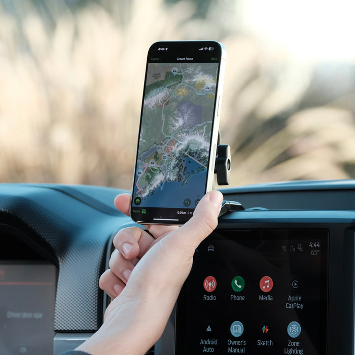 Image of Offroam MagSafe-compatible Phone Mount installed securely in Ford Ranger 2024-2026. This premium phone mount installs easily without drilling or glue. High force magnets hold phone on any trail, road, or track. Perfect placement without blocking screens, driver view, or air flow. Fully adjustable positioning.