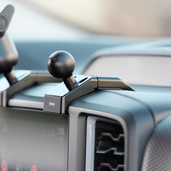 Image of Offroam Mounting Base installed securely in Ford Ranger 2024-2026. This premium all metal phone mounting base installs easily without drilling or glue. Perfect placement without blocking screens, driver view, or air flow.