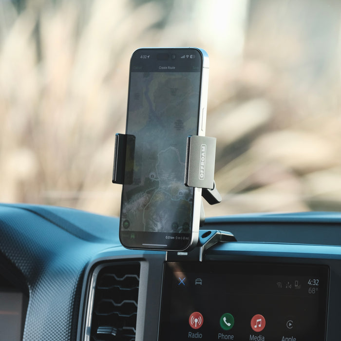 Image of Offroam Phone Mount installed securely in Ford Ranger 2024-2026. This premium phone mount installs easily without drilling or glue. Spring loaded Universal holder for use with any phone. Perfect placement without blocking screens, driver view, or air flow. Fully adjustable positioning.