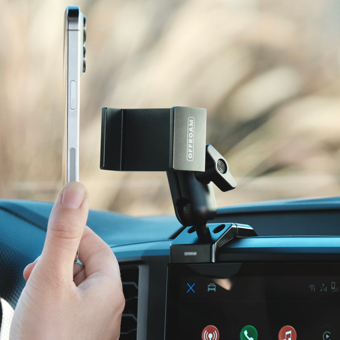 Image of Offroam Phone Mount installed securely in Ford Ranger 2024-2026. This premium phone mount installs easily without drilling or glue. Spring loaded Universal holder for use with any phone. Perfect placement without blocking screens, driver view, or air flow. Fully adjustable positioning.