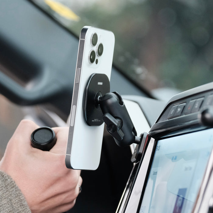 Image of Offroam MagSafe-compatible Phone Mount installed securely in Ford Super Duty 2022 (12in. SYNC4 Touchscreen). This premium phone mount installs easily without drilling or glue. High force magnets hold phone on any trail, road, or track. Perfect placement without blocking screens, driver view, or air flow. Fully adjustable positioning.