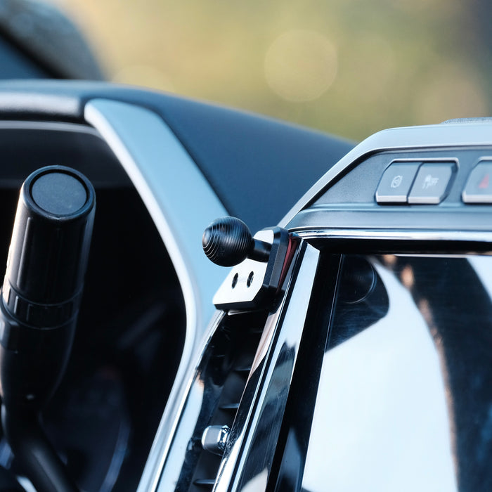 Image of Offroam Mounting Base installed securely in Ford Super Duty 2022 (12in. SYNC4 Touchscreen). This premium all metal phone mounting base installs easily without drilling or glue. Perfect placement without blocking screens, driver view, or air flow.