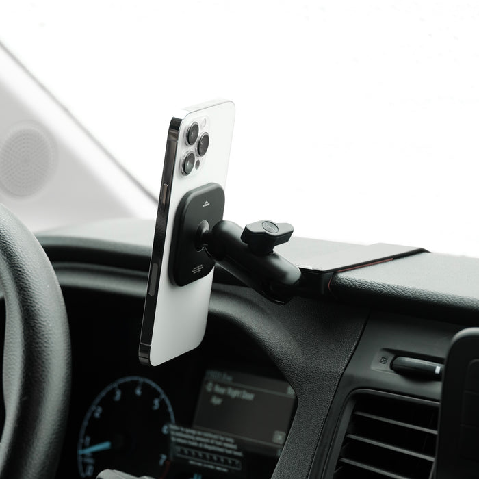 Image of Offroam MagSafe-compatible Phone Mount installed securely in Ford Transit 2020-2026. This premium phone mount installs easily without drilling or glue. High force magnets hold phone on any trail, road, or track. Perfect placement without blocking screens, driver view, or air flow. Fully adjustable positioning.