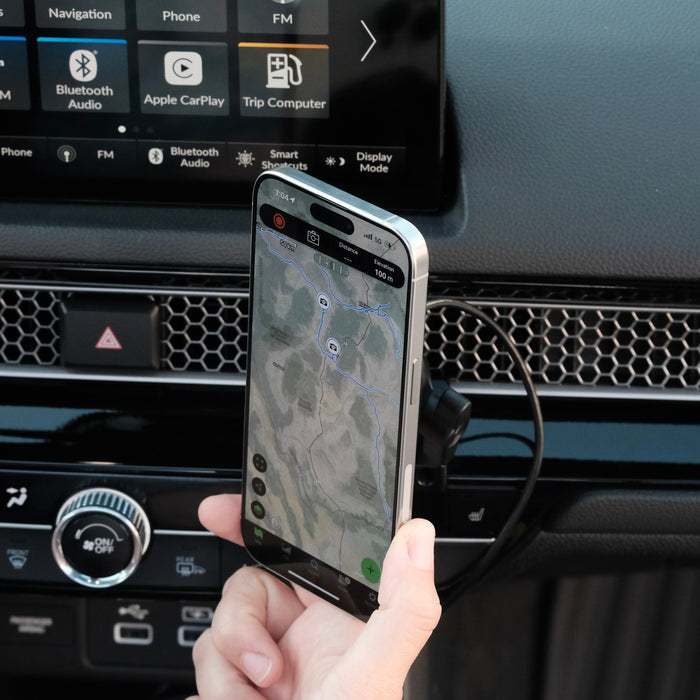 Image of Offroam MagSafe-compatible Phone Mount installed securely in Honda Civic 2022-2026 | CR-V 2023-2026. This premium phone mount installs easily without drilling or glue. High force magnets hold phone on any trail, road, or track. Perfect placement without blocking screens, driver view, or air flow. Fully adjustable positioning.