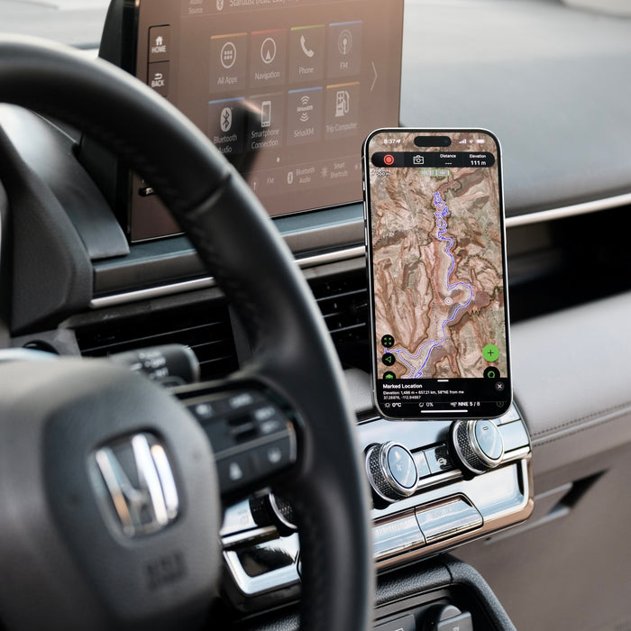 Image of Offroam MagSafe-compatible Phone Mount installed securely in Honda Pilot 2023-2026 | Passport 2026. This premium phone mount installs easily without drilling or glue. High force magnets hold phone on any trail, road, or track. Perfect placement without blocking screens, driver view, or air flow. Fully adjustable positioning.