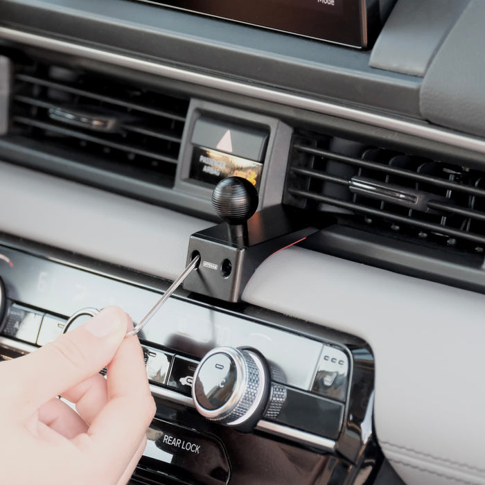 Image of Offroam Mounting Base installed securely in Honda Pilot 2023-2026 | Passport 2026. This premium all metal phone mounting base installs easily without drilling or glue. Perfect placement without blocking screens, driver view, or air flow.