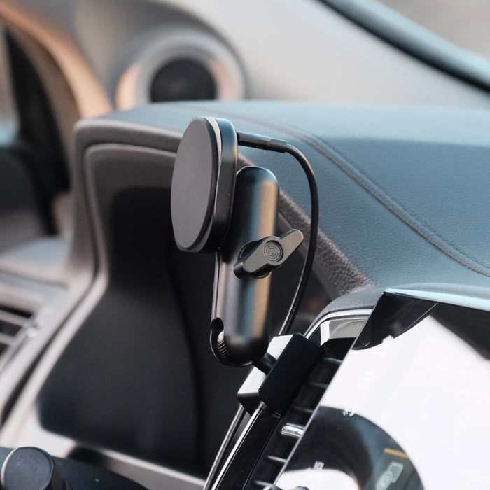 Image of Offroam MagSafe-compatible Phone Mount installed securely in Honda Ridgeline 2016-2026 | Passport 2019-2025 | Pilot 2016-2022. This premium phone mount installs easily without drilling or glue. High force magnets hold phone on any trail, road, or track. Perfect placement without blocking screens, driver view, or air flow. Fully adjustable positioning.