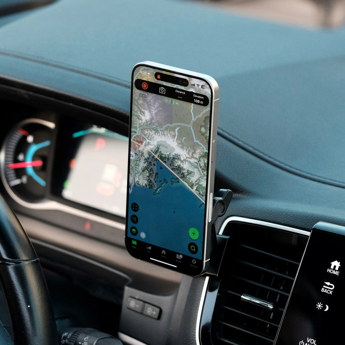 Image of Offroam MagSafe-compatible Phone Mount installed securely in Honda Ridgeline 2016-2026 | Passport 2019-2025 | Pilot 2016-2022. This premium phone mount installs easily without drilling or glue. High force magnets hold phone on any trail, road, or track. Perfect placement without blocking screens, driver view, or air flow. Fully adjustable positioning.