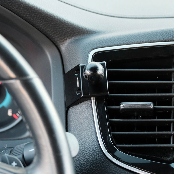 Image of Offroam Mounting Base installed securely in Honda Ridgeline 2016-2026 | Passport 2019-2025 | Pilot 2016-2022. This premium all metal phone mounting base installs easily without drilling or glue. Perfect placement without blocking screens, driver view, or air flow.