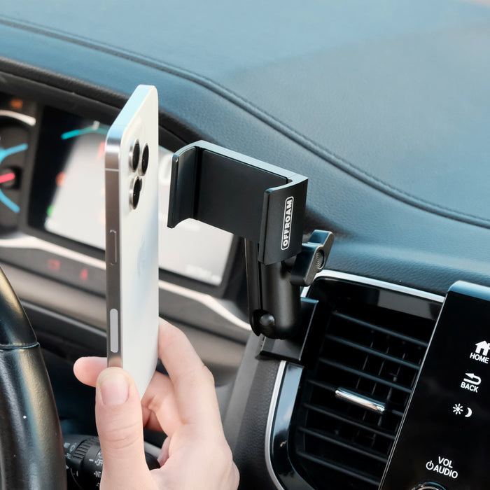 Image of Offroam Phone Mount installed securely in Honda Ridgeline 2016-2026 | Passport 2019-2025 | Pilot 2016-2022. This premium phone mount installs easily without drilling or glue. Spring loaded Universal holder for use with any phone. Perfect placement without blocking screens, driver view, or air flow. Fully adjustable positioning.