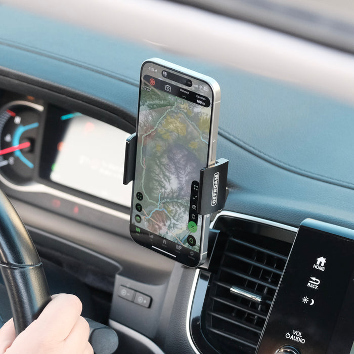 Image of Offroam Phone Mount installed securely in Honda Ridgeline 2016-2026 | Passport 2019-2025 | Pilot 2016-2022. This premium phone mount installs easily without drilling or glue. Spring loaded Universal holder for use with any phone. Perfect placement without blocking screens, driver view, or air flow. Fully adjustable positioning.