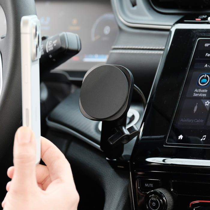 Image of Offroam MagSafe-compatible Phone Mount installed securely in Jeep Grand Cherokee 2022-2026. This premium phone mount installs easily without drilling or glue. High force magnets hold phone on any trail, road, or track. Perfect placement without blocking screens, driver view, or air flow. Fully adjustable positioning.