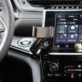 Image of Offroam Phone Mount installed securely in Jeep Grand Cherokee 2022-2026. This premium phone mount installs easily without drilling or glue. Spring loaded Universal holder for use with any phone. Perfect placement without blocking screens, driver view, or air flow. Fully adjustable positioning.