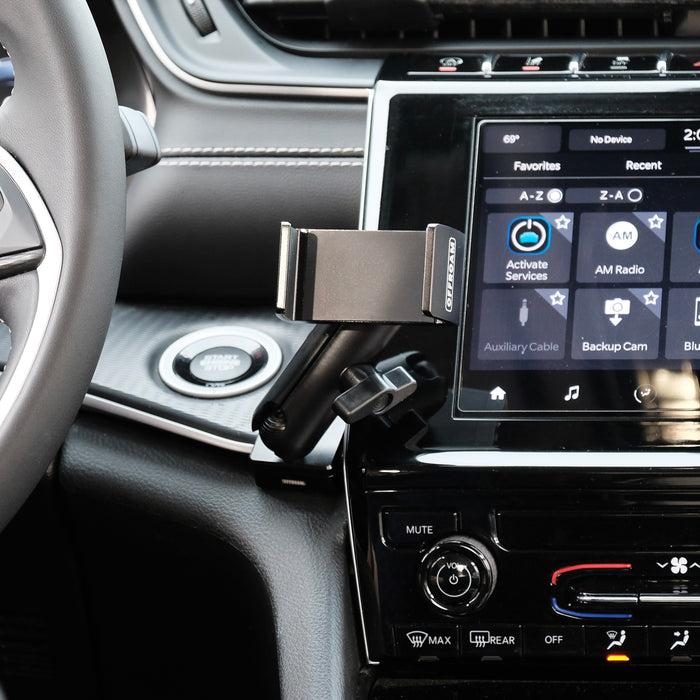 Image of Offroam Phone Mount installed securely in Jeep Grand Cherokee 2022-2026. This premium phone mount installs easily without drilling or glue. Spring loaded Universal holder for use with any phone. Perfect placement without blocking screens, driver view, or air flow. Fully adjustable positioning.