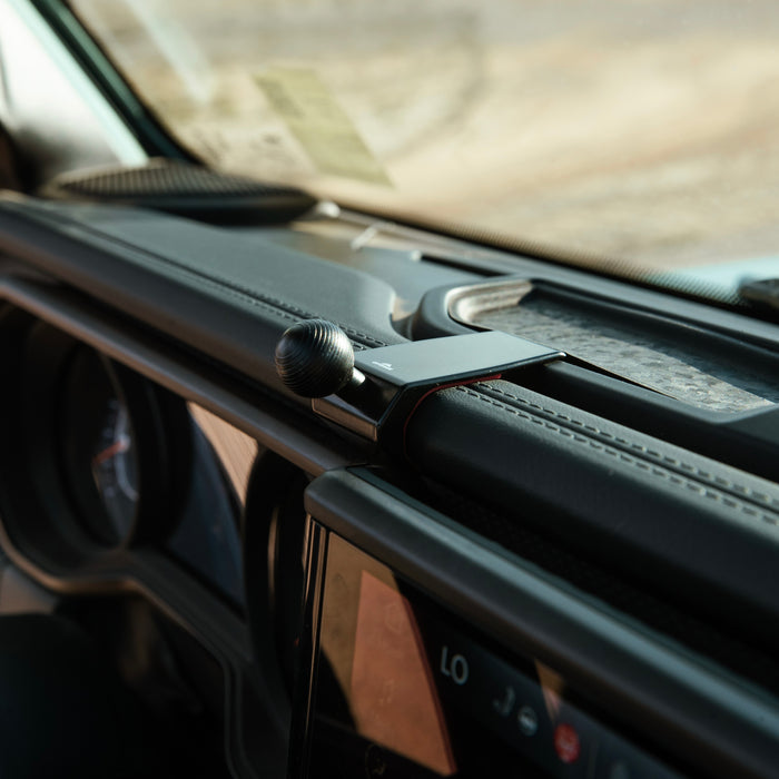 Image of Offroam Mounting Base installed securely in  Jeep Wrangler | Gladiator 2024-2026. This premium all metal phone mounting base installs easily without drilling or glue. Perfect placement without blocking screens, driver view, or air flow.