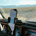 Image of Offroam Phone Mount installed securely in Jeep Wrangler | Gladiator 2024-2026. This premium phone mount installs easily without drilling or glue. Spring loaded Universal holder for use with any phone. Perfect placement without blocking screens, driver view, or air flow. Fully adjustable positioning.