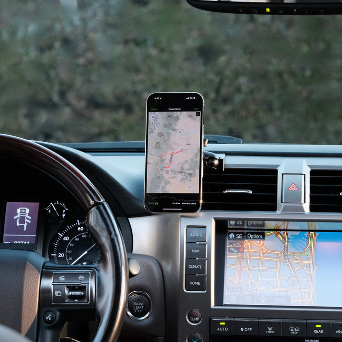 Image of Offroam MagSafe-compatible Phone Mount installed securely in Lexus GX 460 2010-2021. This premium phone mount installs easily without drilling or glue. High force magnets hold phone on any trail, road, or track. Perfect placement without blocking screens, driver view, or air flow. Fully adjustable positioning.