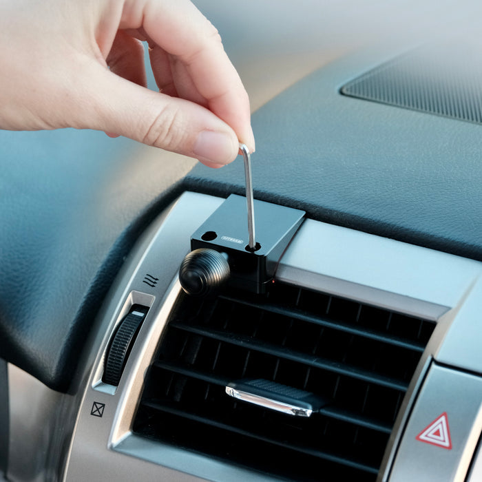 Image of Offroam Mounting Base installed securely in Lexus GX 460 2010-2021. This premium all metal phone mounting base installs easily without drilling or glue. Perfect placement without blocking screens, driver view, or air flow.