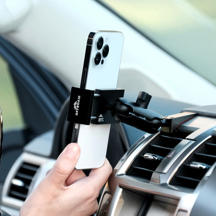 Image of Offroam Phone Mount installed securely in Lexus GX 460 2010-2021. This premium phone mount installs easily without drilling or glue. Spring loaded Universal holder for use with any phone. Perfect placement without blocking screens, driver view, or air flow. Fully adjustable positioning.