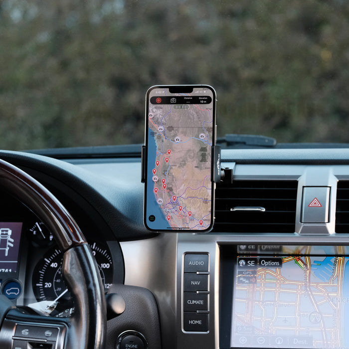 Image of Offroam Phone Mount installed securely in Lexus GX 460 2010-2021. This premium phone mount installs easily without drilling or glue. Spring loaded Universal holder for use with any phone. Perfect placement without blocking screens, driver view, or air flow. Fully adjustable positioning.