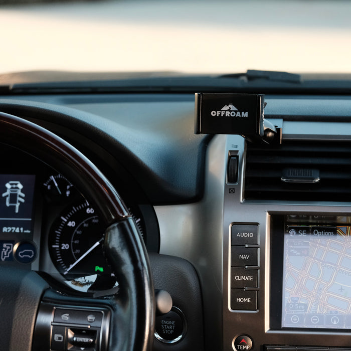 Image of Offroam Phone Mount installed securely in Lexus GX 460 2010-2021. This premium phone mount installs easily without drilling or glue. Spring loaded Universal holder for use with any phone. Perfect placement without blocking screens, driver view, or air flow. Fully adjustable positioning.