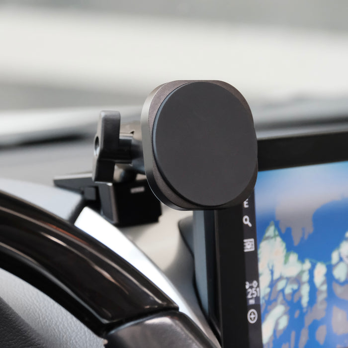 Image of Offroam MagSafe-compatible Phone Mount installed securely in Lexus GX 460 2022-2023. This premium phone mount installs easily without drilling or glue. High force magnets hold phone on any trail, road, or track. Perfect placement without blocking screens, driver view, or air flow. Fully adjustable positioning.