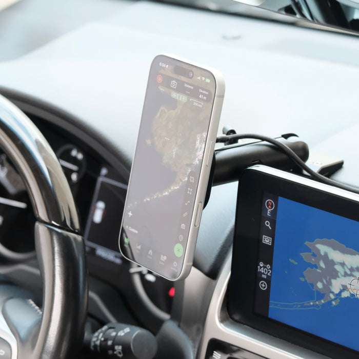 Image of Offroam MagSafe-compatible Phone Mount installed securely in Lexus GX 460 2022-2023. This premium phone mount installs easily without drilling or glue. High force magnets hold phone on any trail, road, or track. Perfect placement without blocking screens, driver view, or air flow. Fully adjustable positioning.
