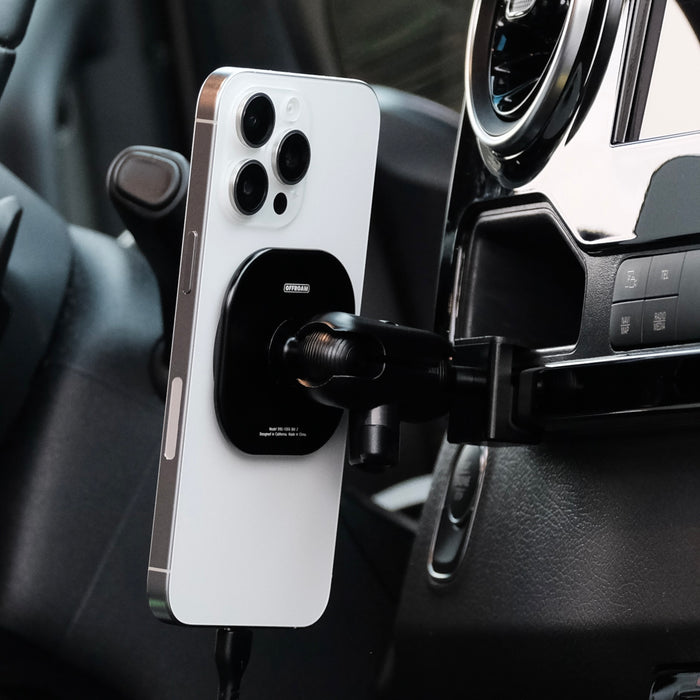Image of Offroam MagSafe-compatible Phone Mount installed securely in Mercedes-Benz Sprinter 2019-2026. This premium phone mount installs easily without drilling or glue. High force magnets hold phone on any trail, road, or track. Perfect placement without blocking screens, driver view, or air flow. Fully adjustable positioning.