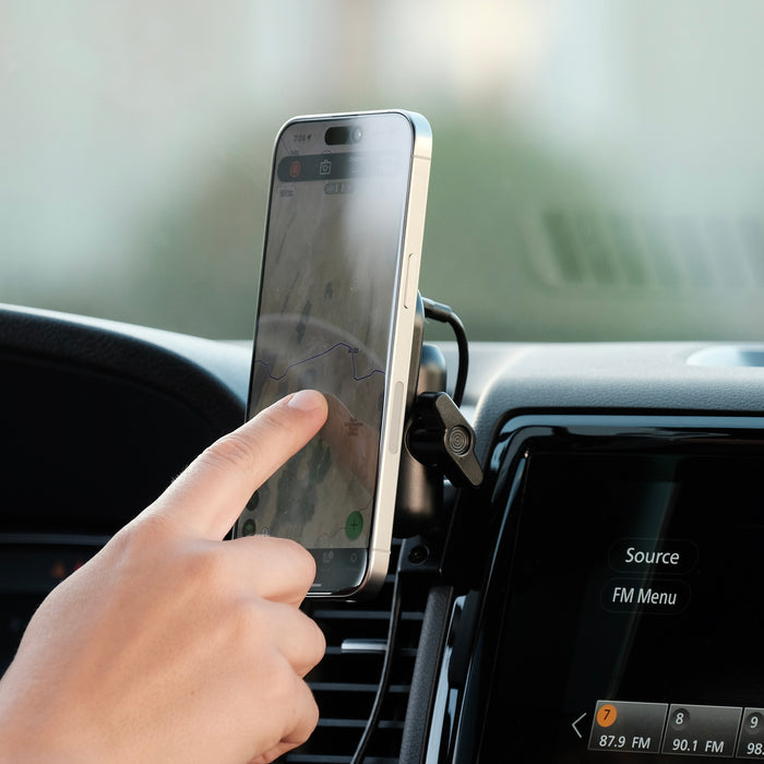 Image of Offroam MagSafe-compatible Phone Mount installed securely in Nissan Frontier 2022-2024. This premium phone mount installs easily without drilling or glue. High force magnets hold phone on any trail, road, or track. Perfect placement without blocking screens, driver view, or air flow. Fully adjustable positioning.