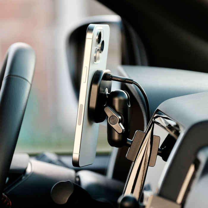 Image of Offroam MagSafe-compatible Phone Mount installed securely in Nissan Frontier 2022-2024. This premium phone mount installs easily without drilling or glue. High force magnets hold phone on any trail, road, or track. Perfect placement without blocking screens, driver view, or air flow. Fully adjustable positioning.