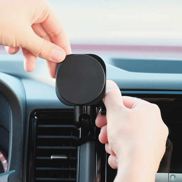 Image of Offroam MagSafe-compatible Phone Mount installed securely in Nissan Frontier 2022-2024. This premium phone mount installs easily without drilling or glue. High force magnets hold phone on any trail, road, or track. Perfect placement without blocking screens, driver view, or air flow. Fully adjustable positioning.