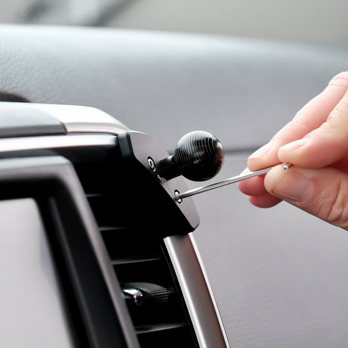Image of Offroam Mounting Base installed securely in Ram 1500/2500/3500 2013-2018 & 1500 Classic 2019-2024. This premium all metal phone mounting base installs easily without drilling or glue. Perfect placement without blocking screens, driver view, or air flow.