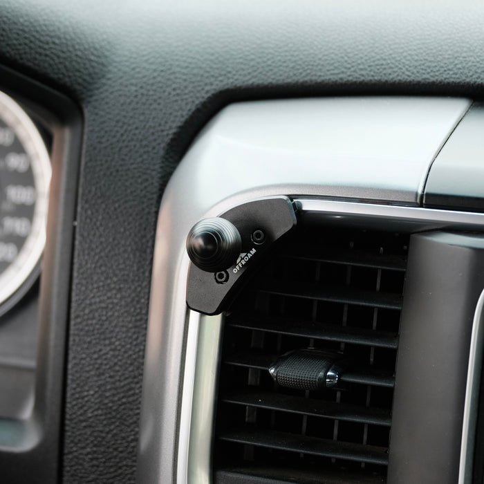 Image of Offroam Mounting Base installed securely in Ram 1500/2500/3500 2013-2018 & Ram Classic 2019-2024. This premium all metal phone mounting base installs easily without drilling or glue. Perfect placement without blocking screens, driver view, or air flow.